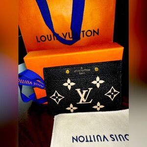 Louis Vuitton Bicolor Monogram Empreinte Leather wallet M81022